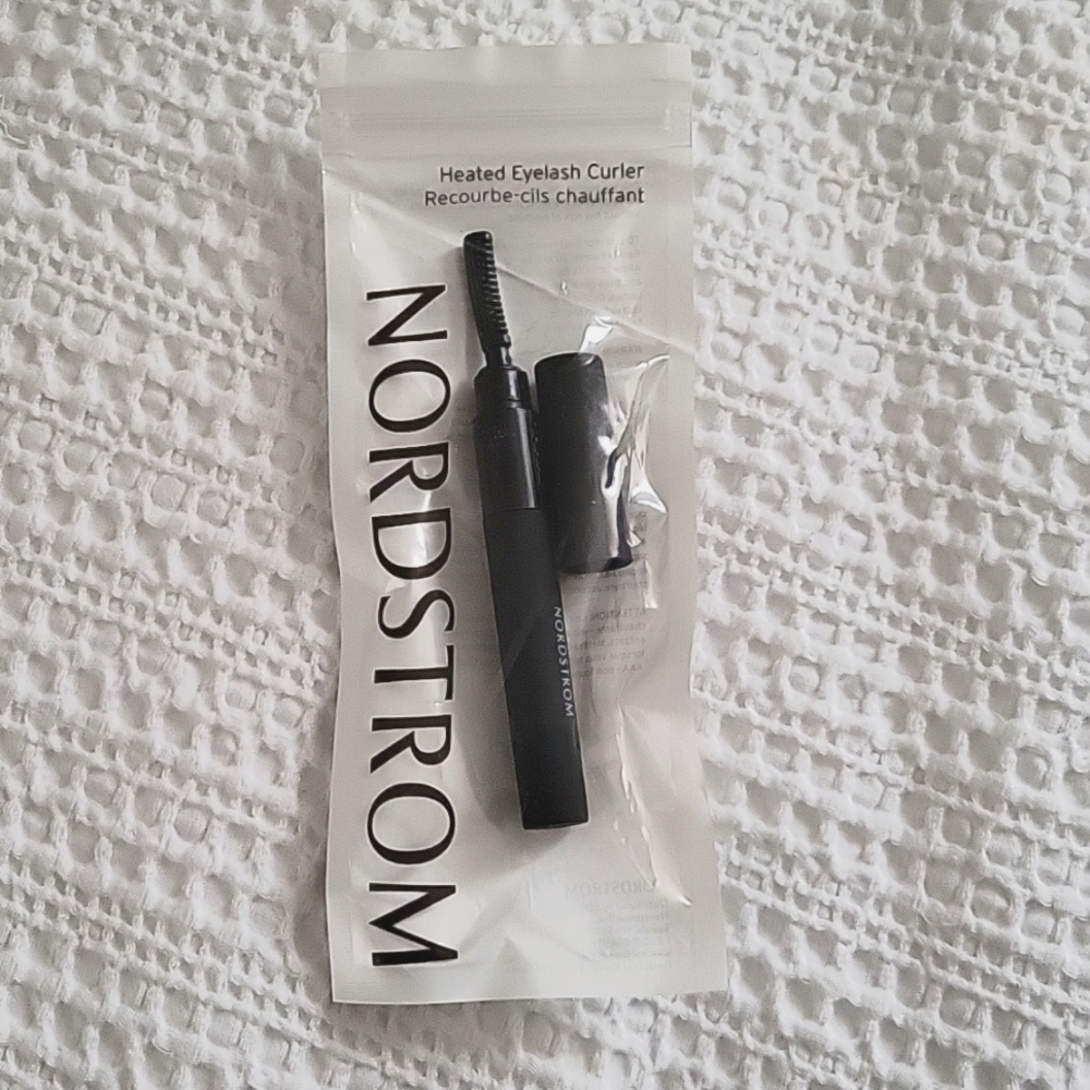 Heated eyelash curler